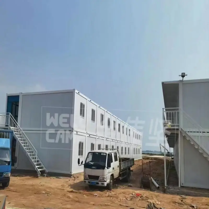 Casa de contenedores de paquete plano de 2 pisos fuerte y fácil instalación