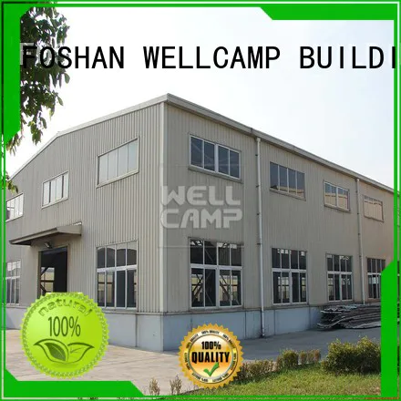 widely steel warehouse with brick wall