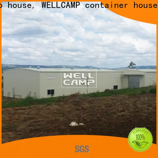 large steel warehouse with brick wall for chicken shed